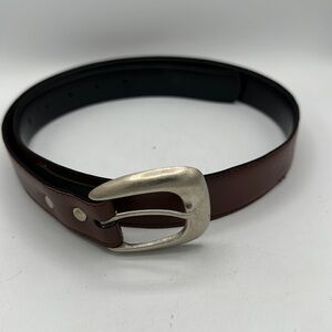 Brown belt with silver buckle